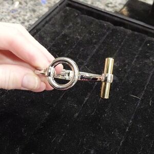 Elegant Silver and Gold Women's Bracelet. Hinge opening. 3in wide. Like new cond